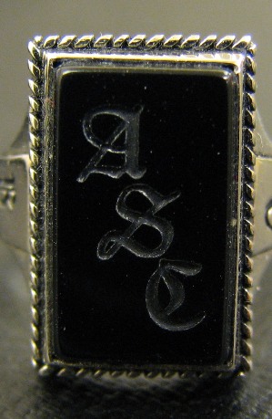 The Agnes Scott Ring, a square black onyx stone with "ASC" engraved into it.